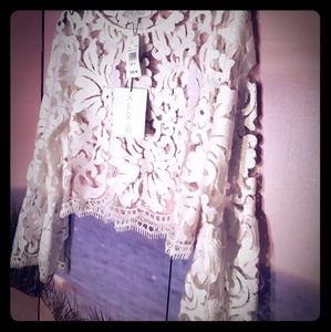 Alexis size medium long sleeved lace crop top NWT